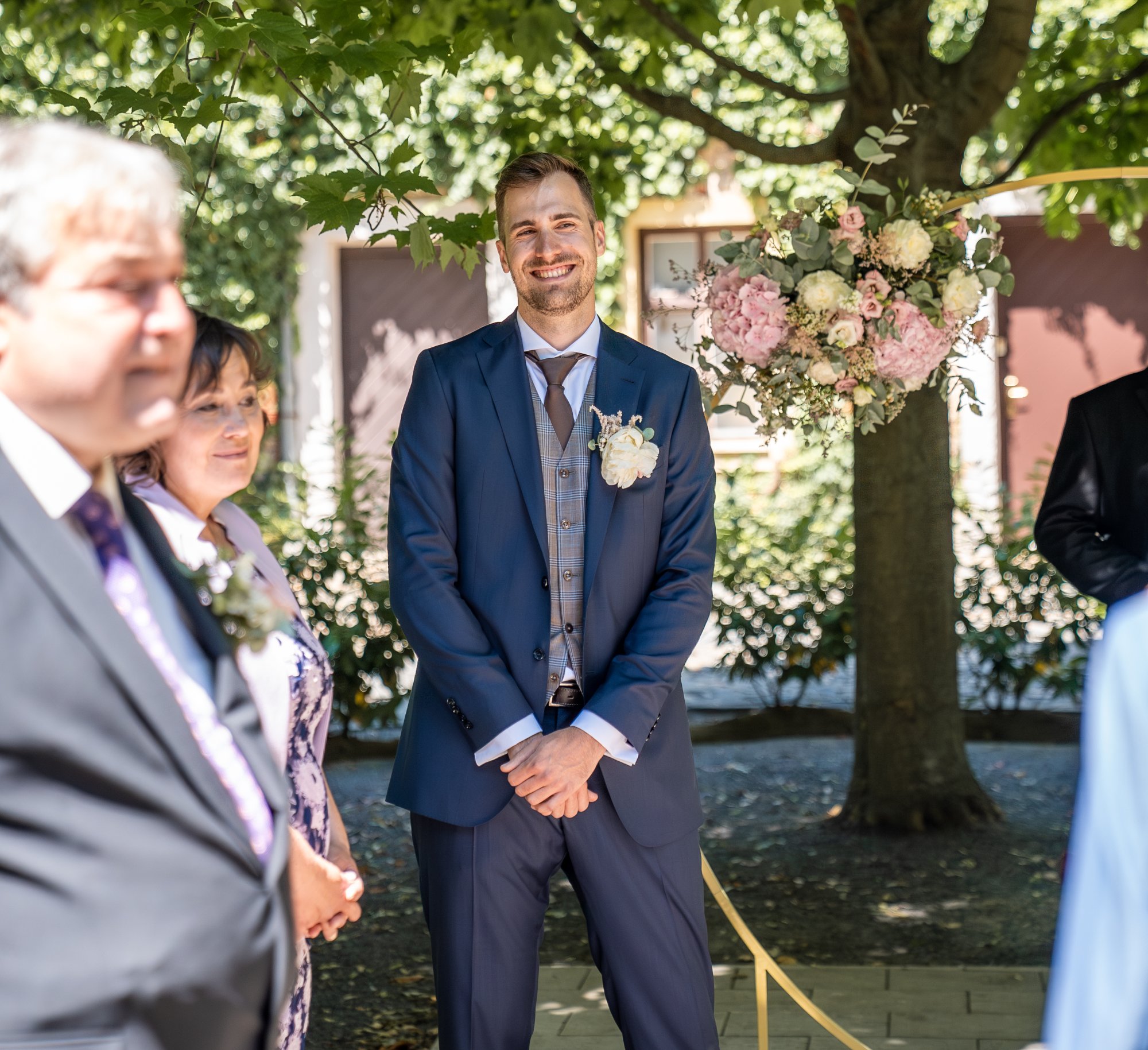 Groom emotional moment at altar Czech wedding ceremony