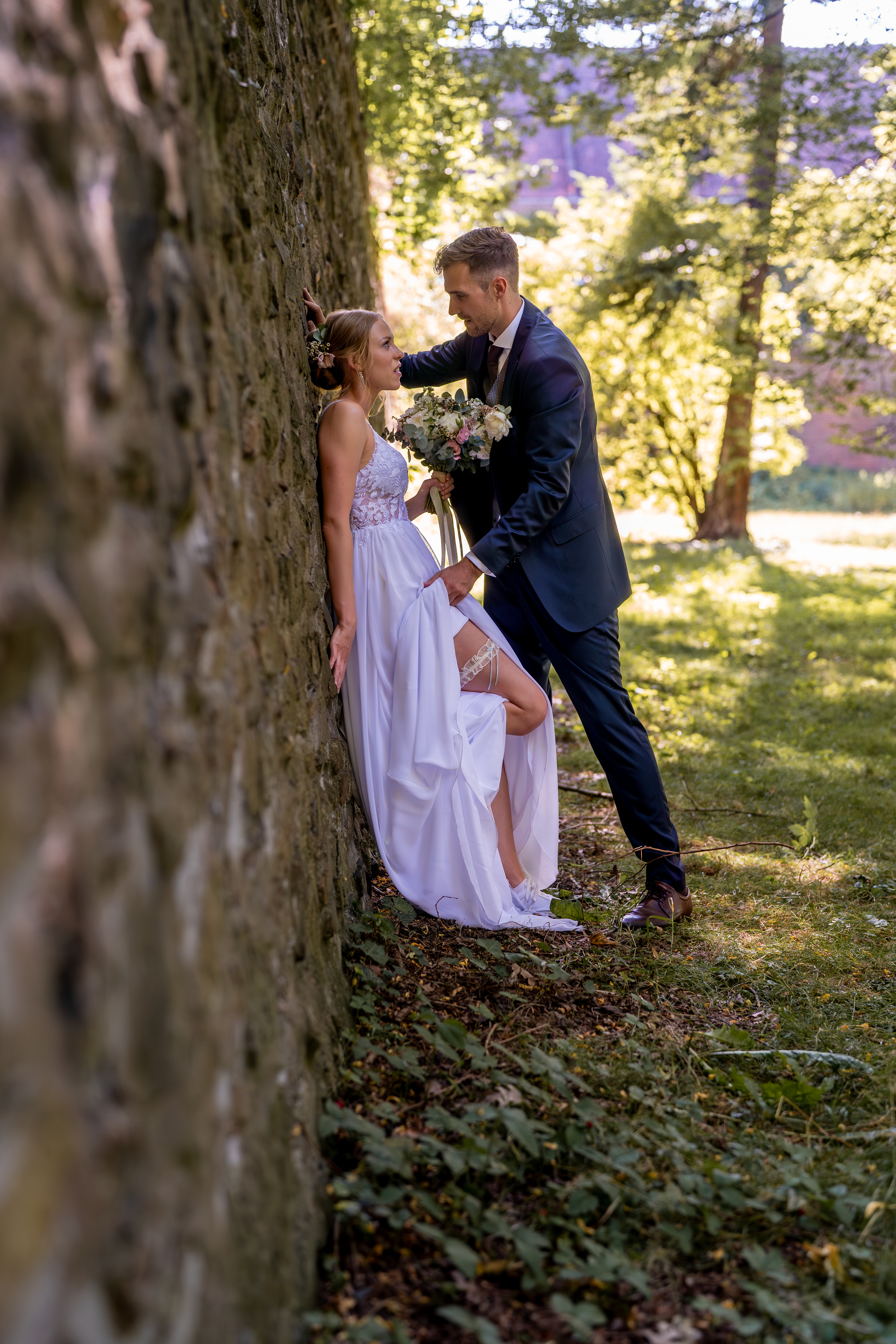 Couple candid portrait flirting wedding day Prague